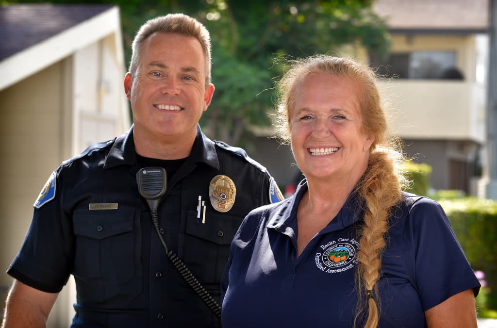 Roger Flanders with an Orange County Health Care Agency outreach partner